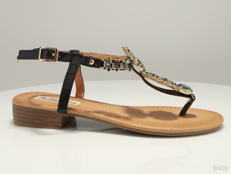 Ravne sandale crne boje sa zlatnim detaljima